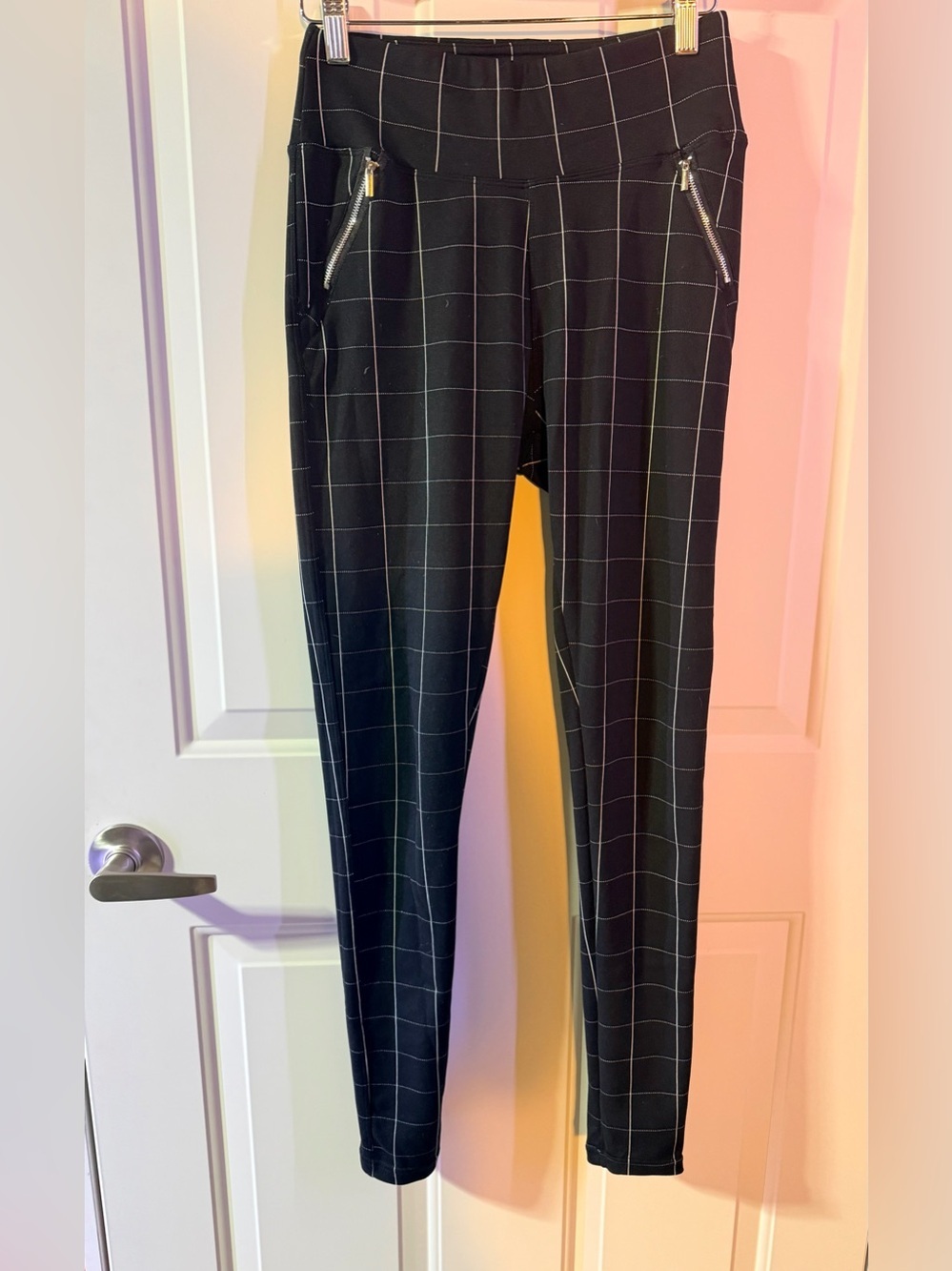 Black Fabric Garment with White Stitch Detail medium pants